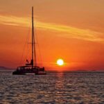 1 santorini cruise catamaran with bbq drinks day of sunset Santorini: Cruise Catamaran With BBQ & Drinks Day of Sunset
