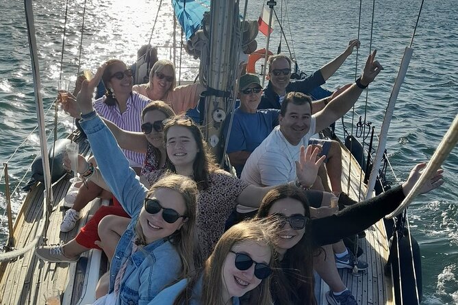 1 small group sailboat sunset tour in lisbon with a drink Small Group Sailboat Sunset Tour in Lisbon With a Drink