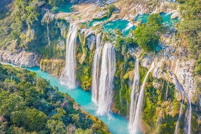 Tamul Waterfall and Water Cave on a Wooden Canoe