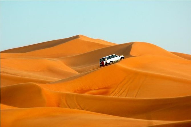 Thrilling Red Dune Desert Safari With 45 Minutes Dune Bashing and BBQ Dinner