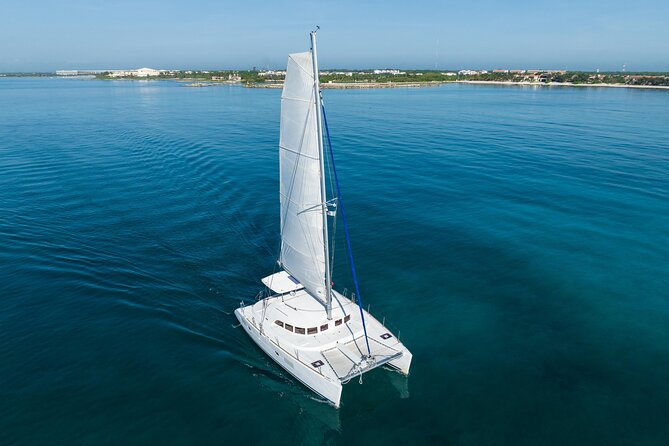 8-Hour Private 38 Catamaran 2-Stop Tour to Cozumel With Food,Open Bar & Snorkel - Amenities and Policies