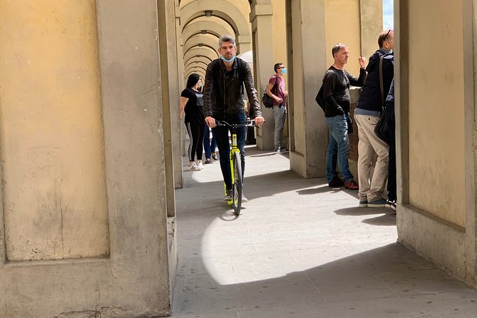 90 Min Footbike Tour in Florence - Activity and Guide Details