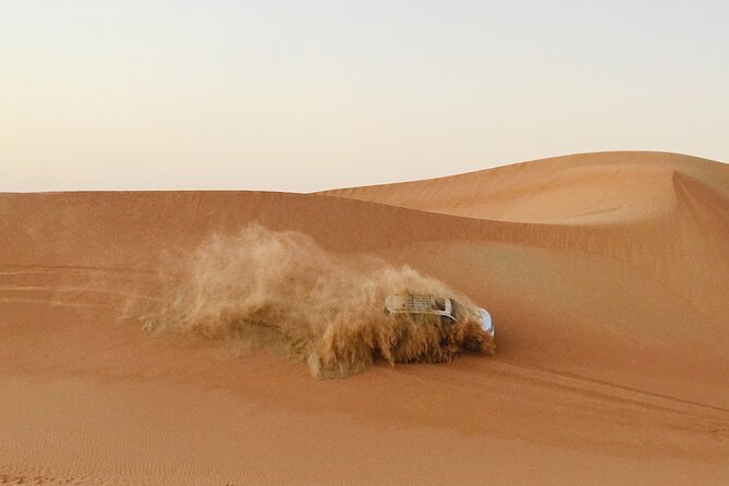 Abu Dhabi Morning Desert Safari,Dune Bashing,Sandboarding,Camel Riding&Quad Bike - Thrilling Dune Bashing Experience