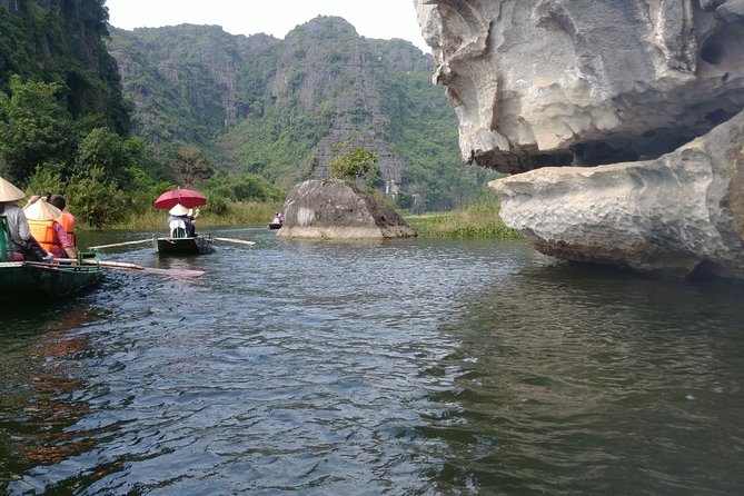 Bai Dinh Pagoda & Trang an Grottoes Boating Full Day Trip - Boating Experience at Trang an Grottoes