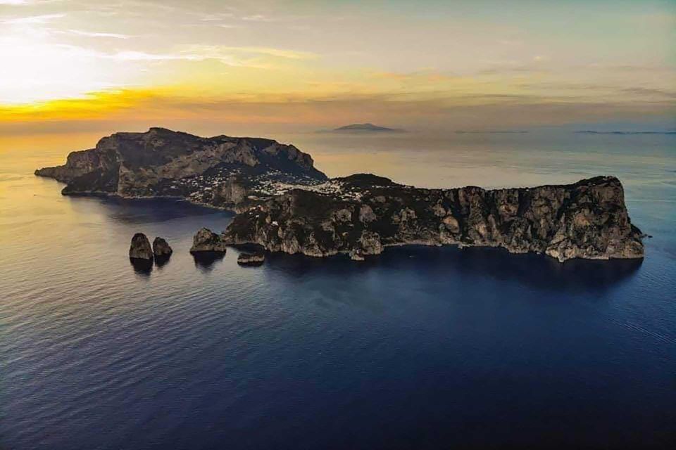 Capri: Sunset Boat Tour With Aperitif - Duration and Features Highlights