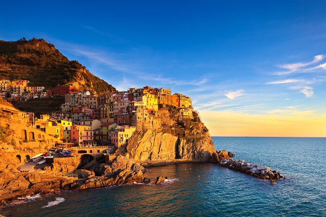 Cinque Terre Sunset Boat Tour on a Traditional Wooden Gozzo - Departure Point and Time