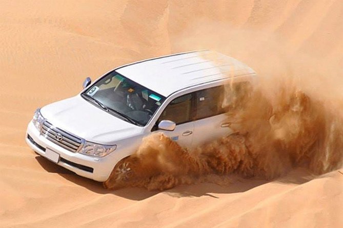 Dubai Sunset Desert Tour: Sandboarding, Dune-Bashing & Dinner - Cancellation Policy