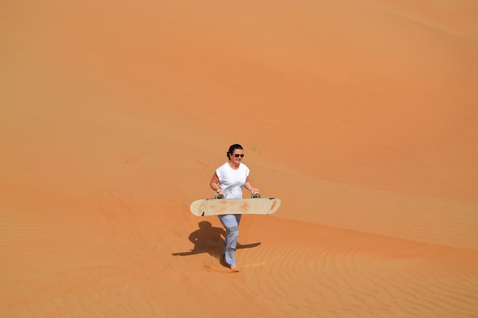 Exclusive Sunrise Desert Safari With Camel Ride Sand Boarding Dune Bashing - Customer Reviews and Ratings