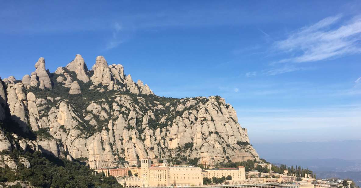 From Barcelona: Montserrat Mountain Hike and Abbey Tour - Experience Highlights