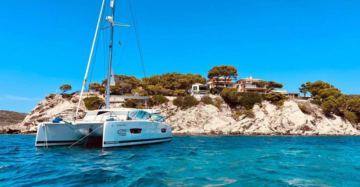 From Palma: Luxury Catamaran Group Tour With Tapas & Drinks - Experience Highlights