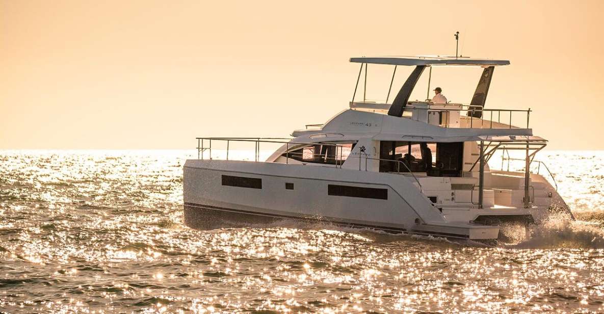 From Rhodes: Private Catamaran Sunset Cruise All Inclusive - Main Sites Passed