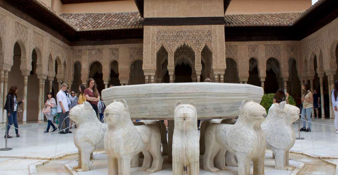 Granada: Alhambra Guided Tour With Nasrid Palaces - Cancellation and Pickup Options