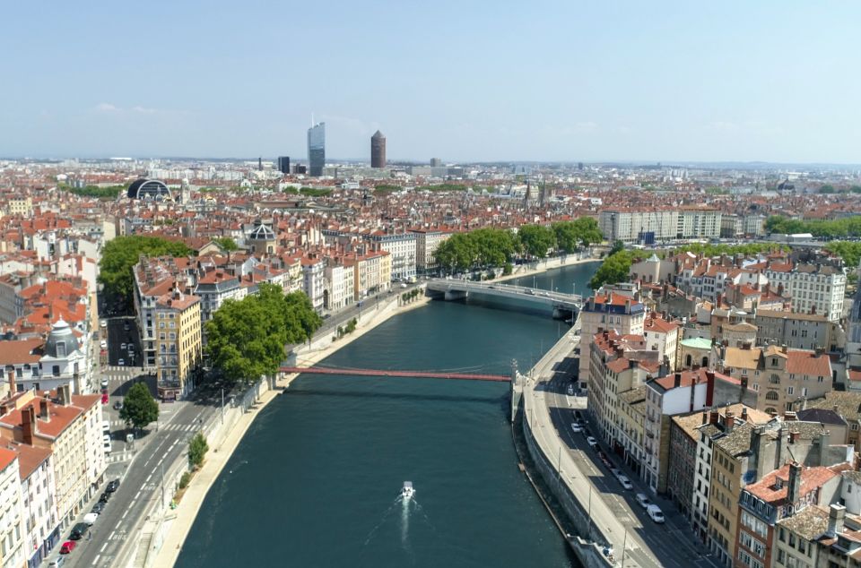 Lyon: From Confluence to Barbe Island in Electric Boat - Experience Highlights