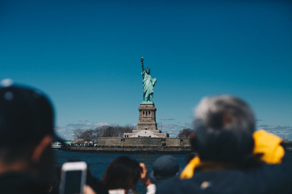NYC: Statue of Liberty & Ellis Island Guided City Boat Tour - Experience Highlights