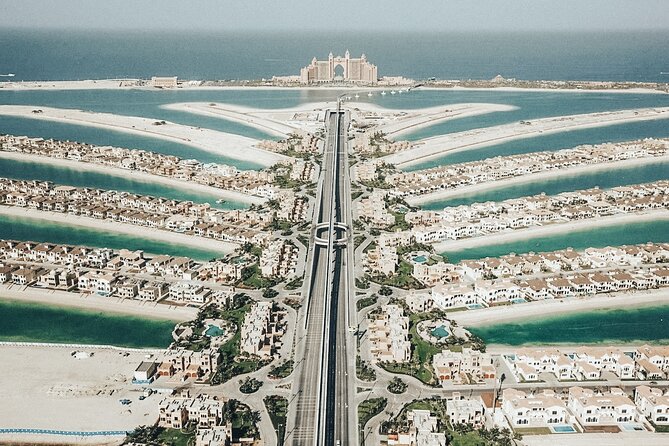 Private Dubai Driving Tour With Palm Jumeirah, Dubai Creek and Deira'S Souks - Cultural Insights