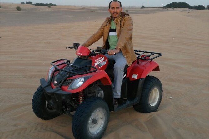 Red Dune Bashing With Quad Bike Sandboard Camel Ride & BBQ Dinner - Thrilling Quad Bike Sandboarding Experience