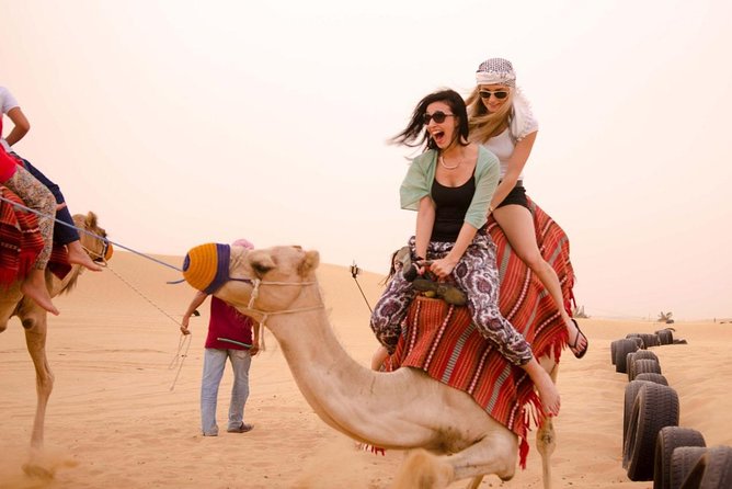 Red Dune Desert Safari With ATV Quad Bike, Live Show, Camel Ride & Dinner - Booking Information