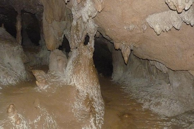 Saint Hermans Cave Hiking and Blue Hole Tour From Belize City - Cavern Scrambling