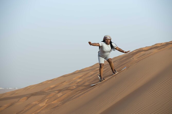 Sand Boarding Camel Ride and 1 Hour ATV in Dubai Lahbab Red Dunes - Expert Guides and Safety Measures