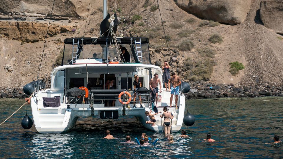 Santorini: Sailing Catamaran Yacht Cruise With Food & Drinks - Inclusions