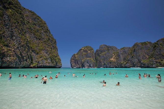 The Inviting Beauty of Phi Phi Islands - Sunbathing and Limestone Cliff Exploration