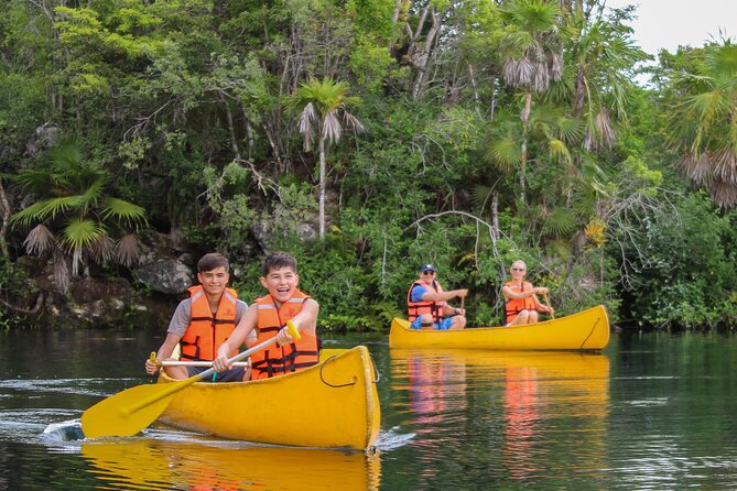 4 Private Cenotes, Zip-Lines, Canoes & Mayan Village With Delicious Lunch - Tranquil Canoe Experience