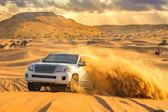 Desert Safari With Dune Bashing and Unlimited 4 Course Barbecue Dinner - Thrilling Dune Bashing Session