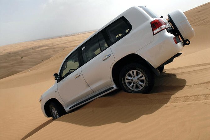 Dubai: 4X4 Desert Safari With BBQ Dinner - Engage in Camel Riding