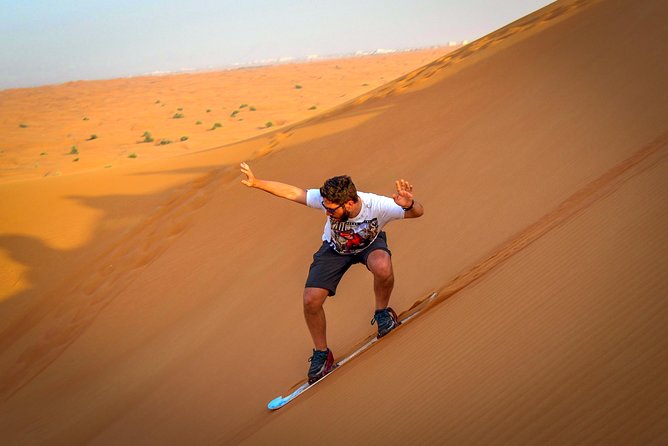 Evening Red Dunes Desert Safari Dubai With Sanboarding Camel Ride & BBQ - Safety Measures and Logistics