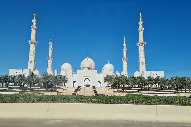 From Dubai: Emirates Palace Hi-Tea With Sheikh Zayed Mosque Visit - Legal and Operational Guidelines