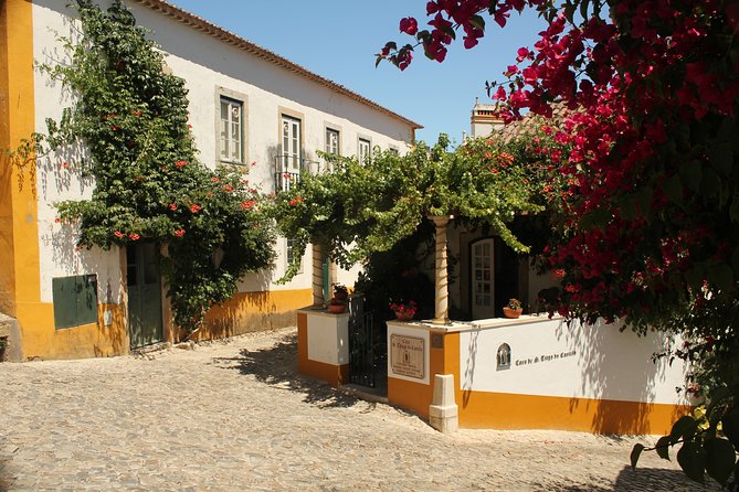 From Lisbon - Private Tour to Obidos, Nazare and Fatima With Drop-Off in Porto - Booking Details