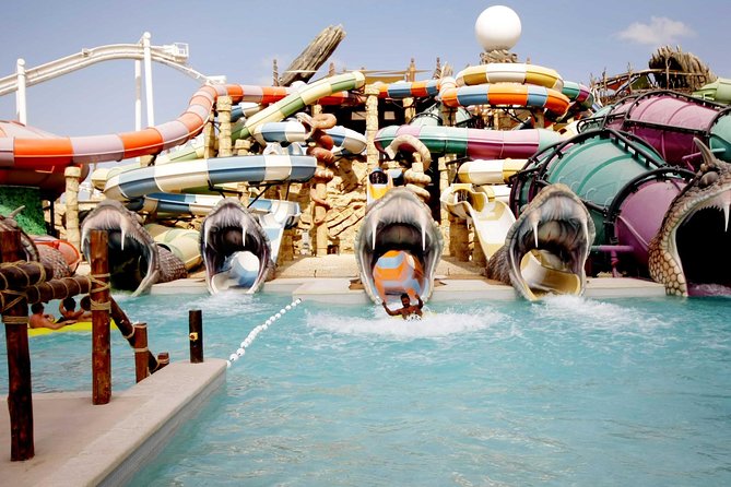 Full Day Abu Dhabi City Tour & Yas Water World Entry Ticket With Transfers - Pearl Diving Activity