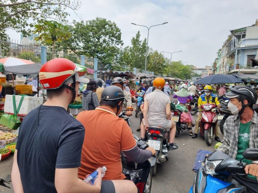 HCM City: Sightseeing Tour With Coffee and Fruit by Scooter - Details of the Guided Tour