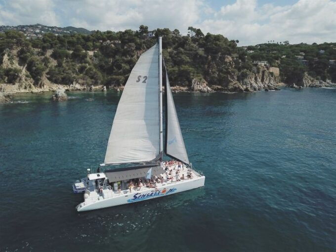 Lloret De Mar: Sunset Catamaran Cruise With DJ and Drinks - Inclusions