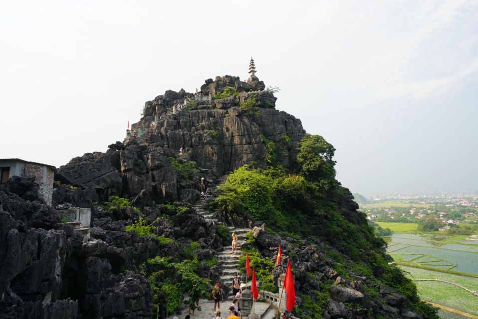 Local Farmer Riding Buffalo - Hoa Lu - Tam Coc Boating Tour - Full Itinerary