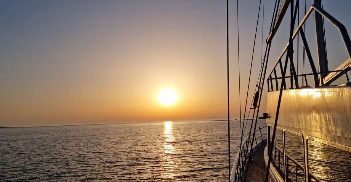 Mykonos: Sunset Boat Cruise With Light Dinner & Drinks - Onboard Experience and Activities