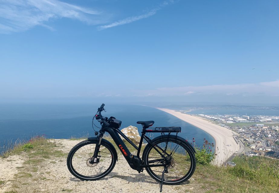 Poole: Old Harry Rocks and Corfé Castle Guided E-bike Tour - Experience