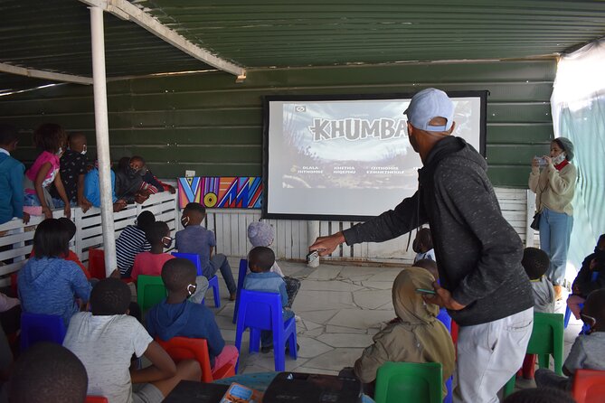 Pop-Up Cinema in the Community Post Film Discussion With Locals - Facilitating Post-Film Discussions