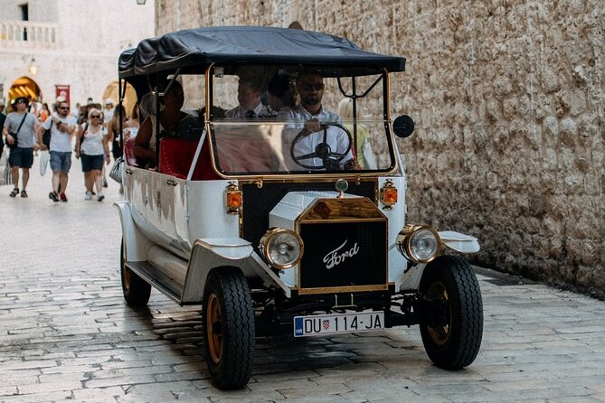 Private Sightseeing Tour in Dubrovnik With a Classic Old Car - Local Guide Experience