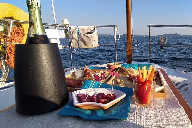 Private Tour on a Sailing Boat on Lake Maggiore With Aperitif and Music - Tour Schedule and Itinerary