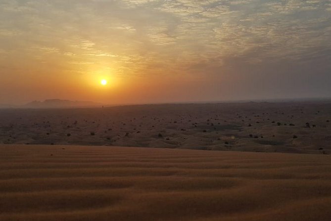 Sunrise View Desert Safari With Dune Bashing and Sand Boarding - Sand Boarding Excitement in Desert