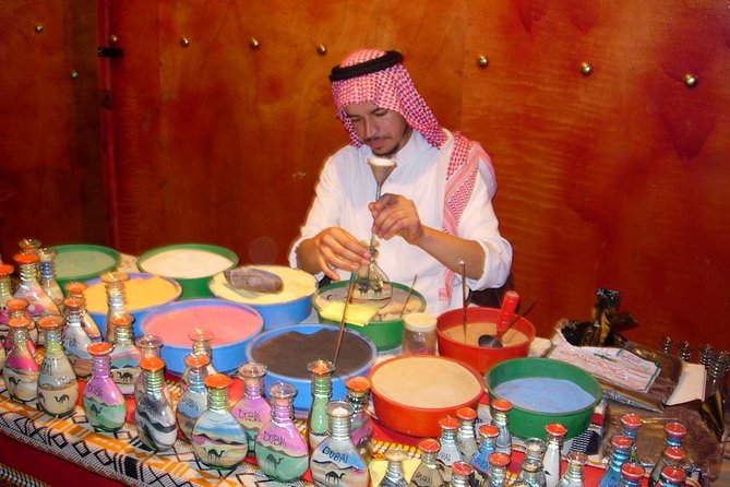 Arabian Desert Safari, BBQ Dinner, Camel Ride, Sand Boarding ATV & Live Shows - Ride Camels in the Desert