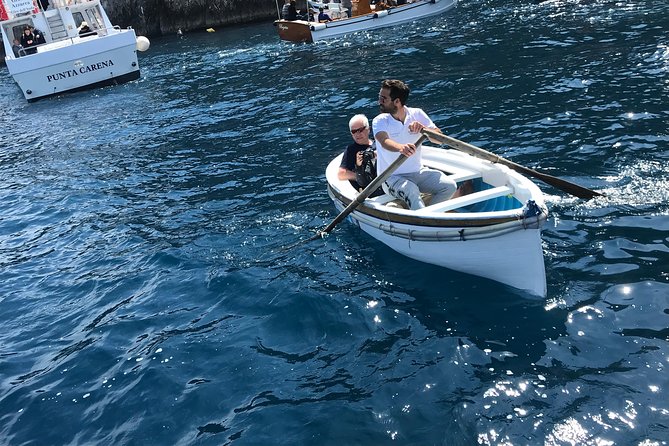 Capri Island & Blue Grotto Small Group Boat Tour From Positano - Traveler Engagement and Photos