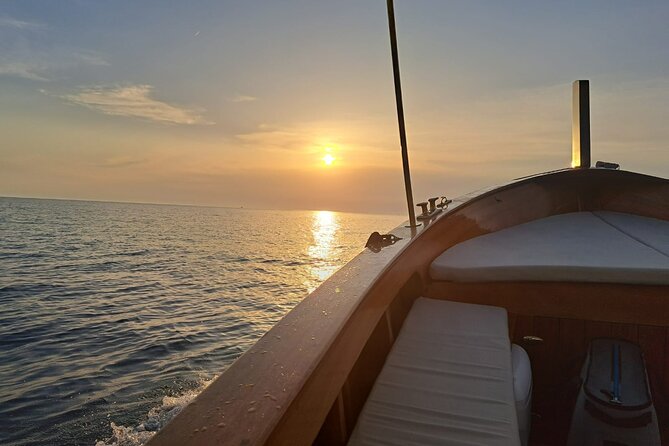 Cinque Terre Sunset Boat Tour on a Traditional Wooden Gozzo - Sunset Views and Atmosphere