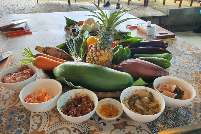 Cooking Class in Tra Que Village With Market and Garden Tour - Meal Preparation