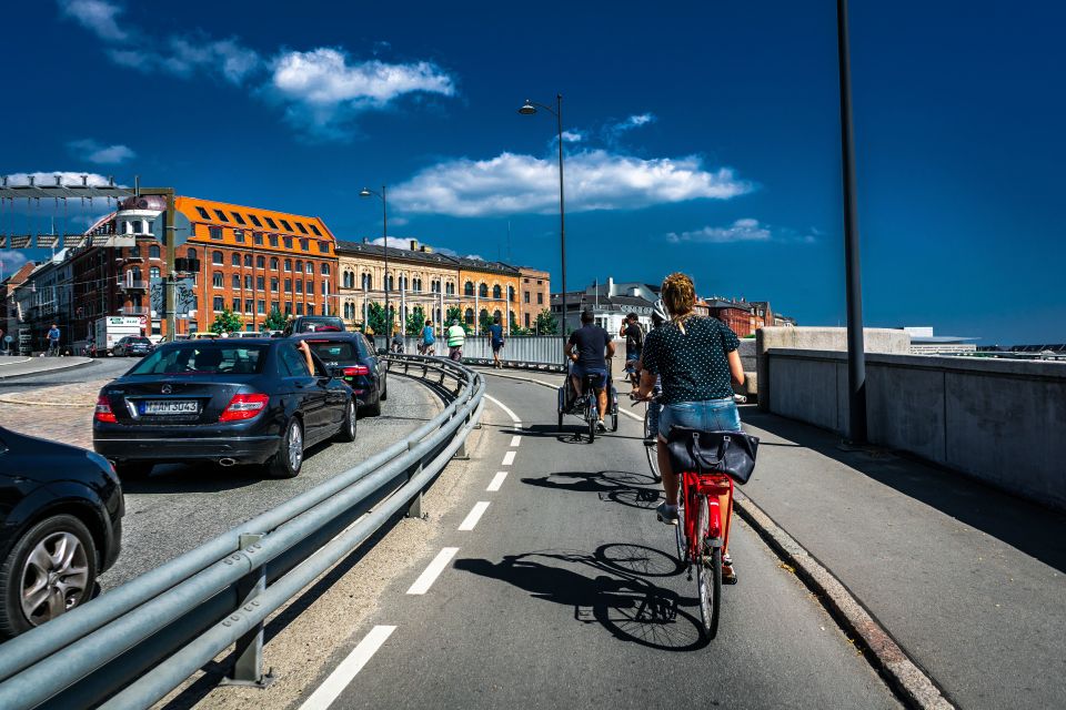 Copenhagen: Complete City by Bike Tour - Multilingual Tour Guide Options