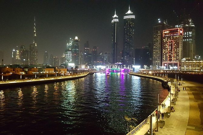 Dubai Canal Dinner Cruise With Transfers - Boat Capacity and Deck Views