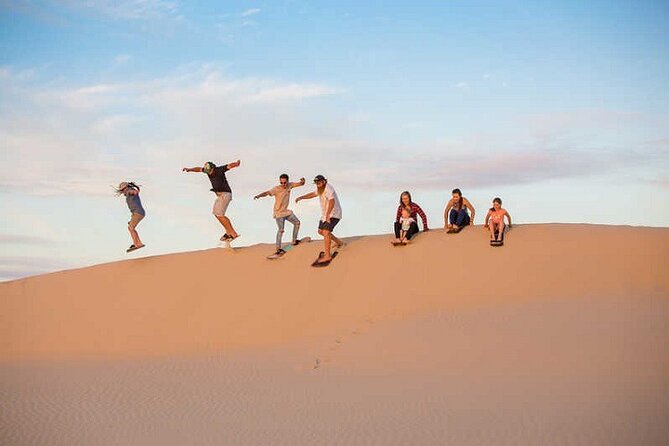 Dubai: Desert Quad Bike Safari, Camel Ride, Sand Surf, & BBQ - Booking Policies and Information