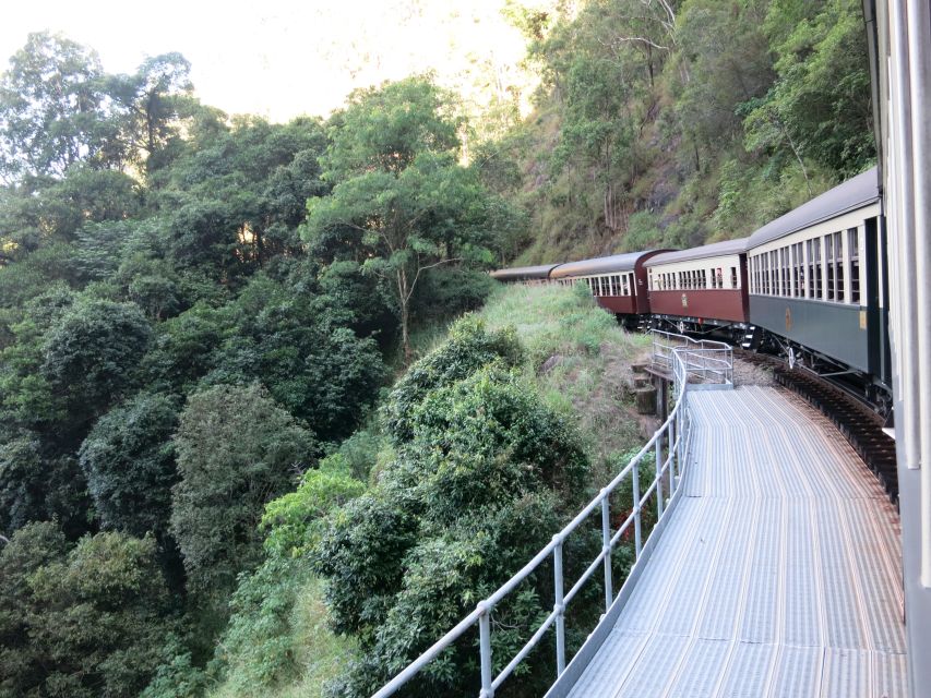 From Port Douglas: Kuranda via Scenic Rail or Skyrail Option - Tour Description