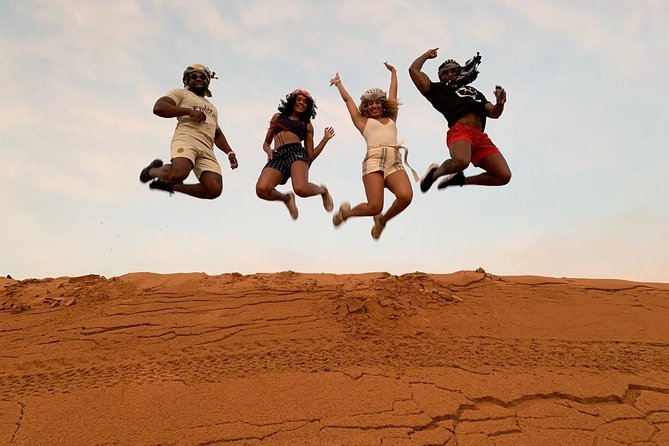 Morning Dune Bashing With Sand Boarding And Camel Ride in Red Dunes Desert - Pricing Information